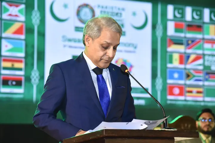Ceremonial address before the PAC and Pakistan-Africa backdrop.