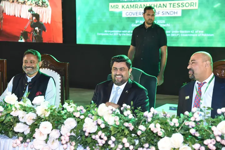 PAC leadership seated on the ceremonial stage.